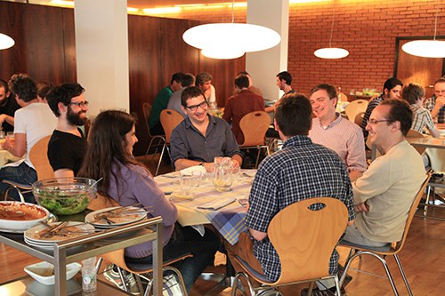 Dining room, people sitting around a table