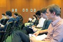 young researchers sitting in a lecture hall