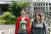 two early career researchers in front of the Boy surface at the MFO