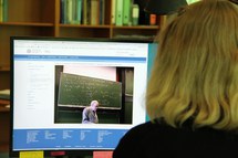 Person watching a lecture video recording